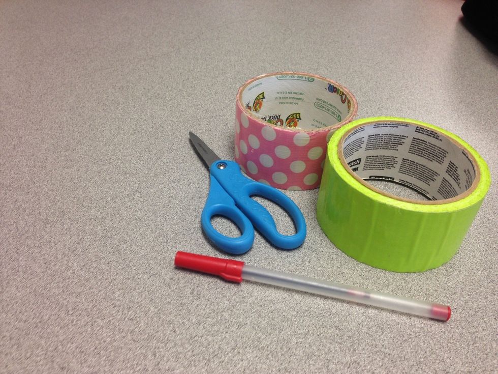 First, gather all materials which includes duct tape, scissors, and a pen.