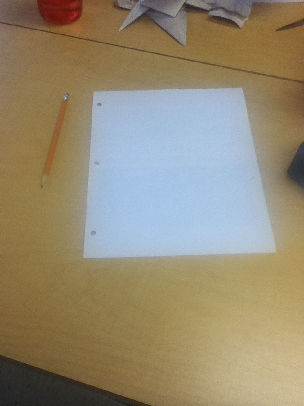 First gather all your materials a pencil and a pice of paper.