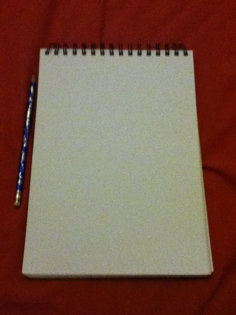 First gather supplies: pencil, rubber and piece of paper
