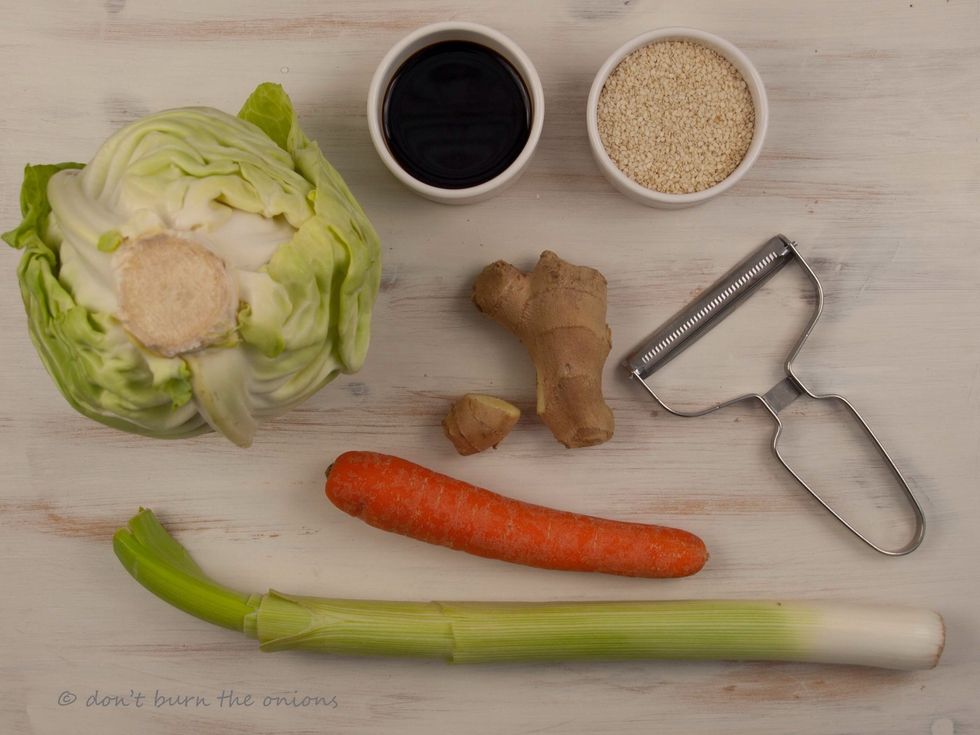 First gather your ingredients. Pictured is the sweetheart cabbage (minus its pointy head!) My preferred cabbage for this dish as it is softer and sweeter than other varieties.