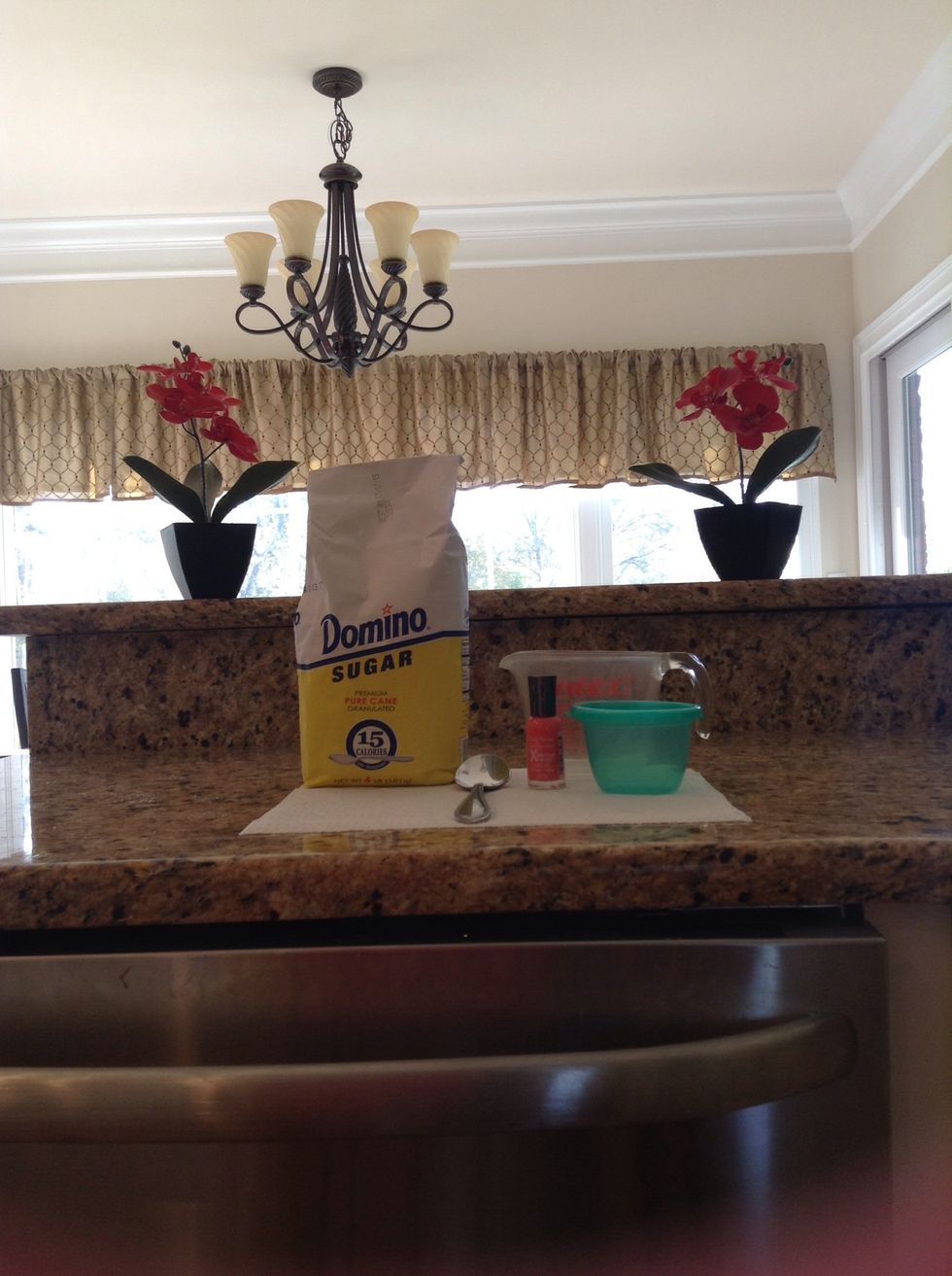 First, gather your supplies. You will need granulated sugar, a spoon, nail polish of your choice, a measuring cup, and a container to put your finished polish in. All ready?