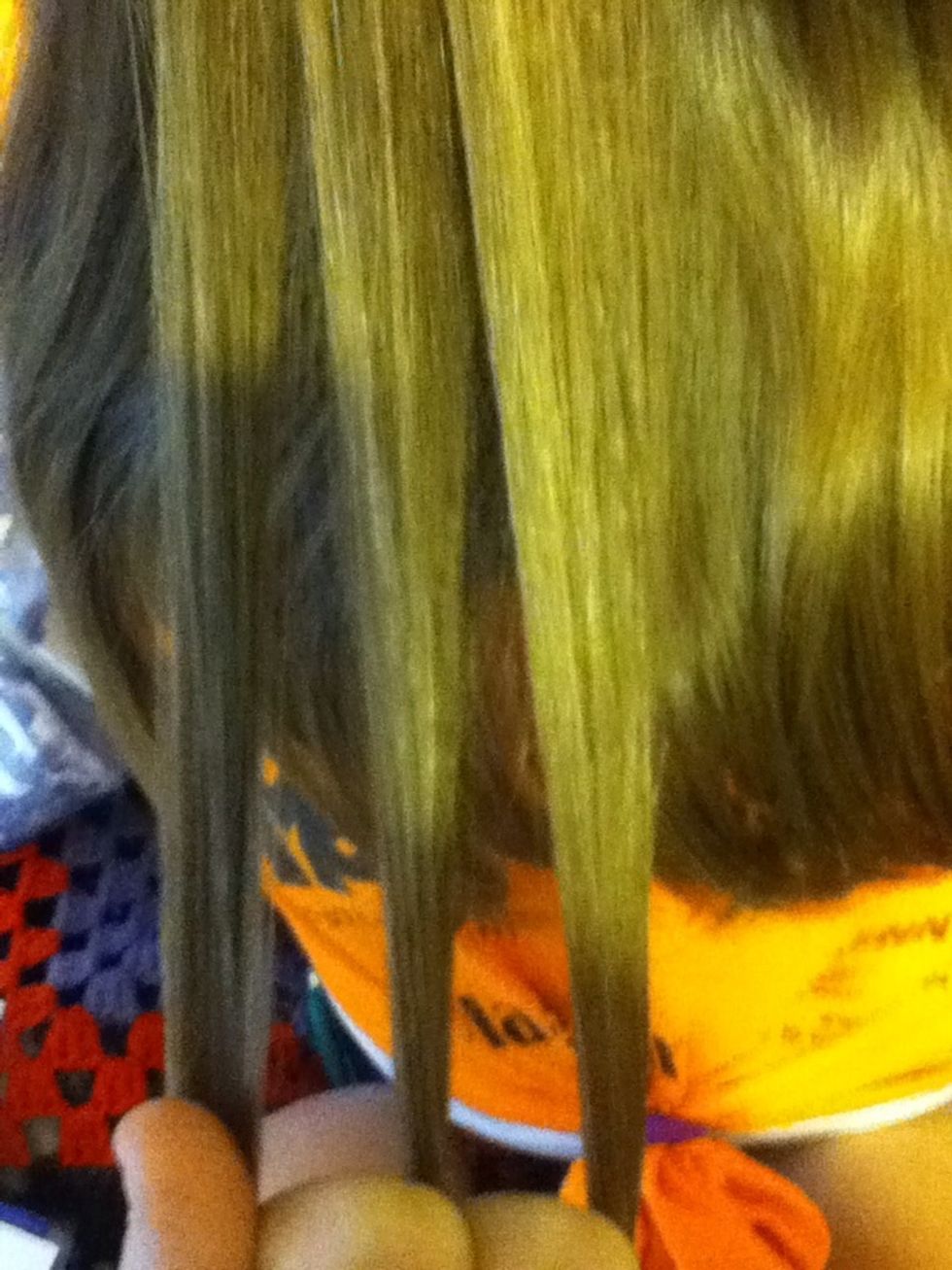 First, get a chunk if hair and split it into 3 pieces.