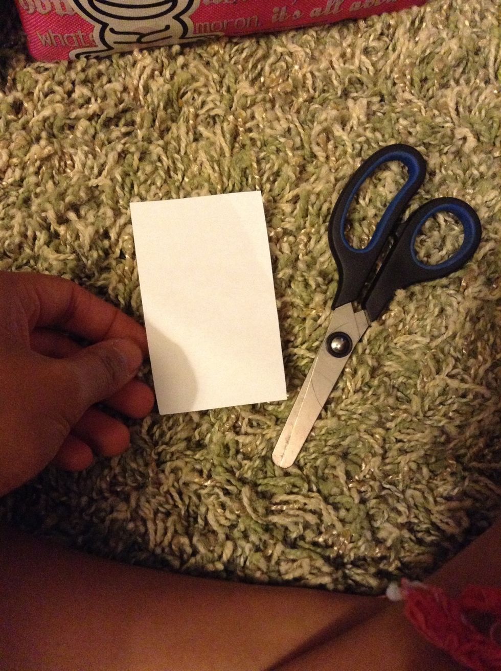 First get a piece of card stock. Cut the card stock into card sizes (i.e. Pokemon size , magic card size).