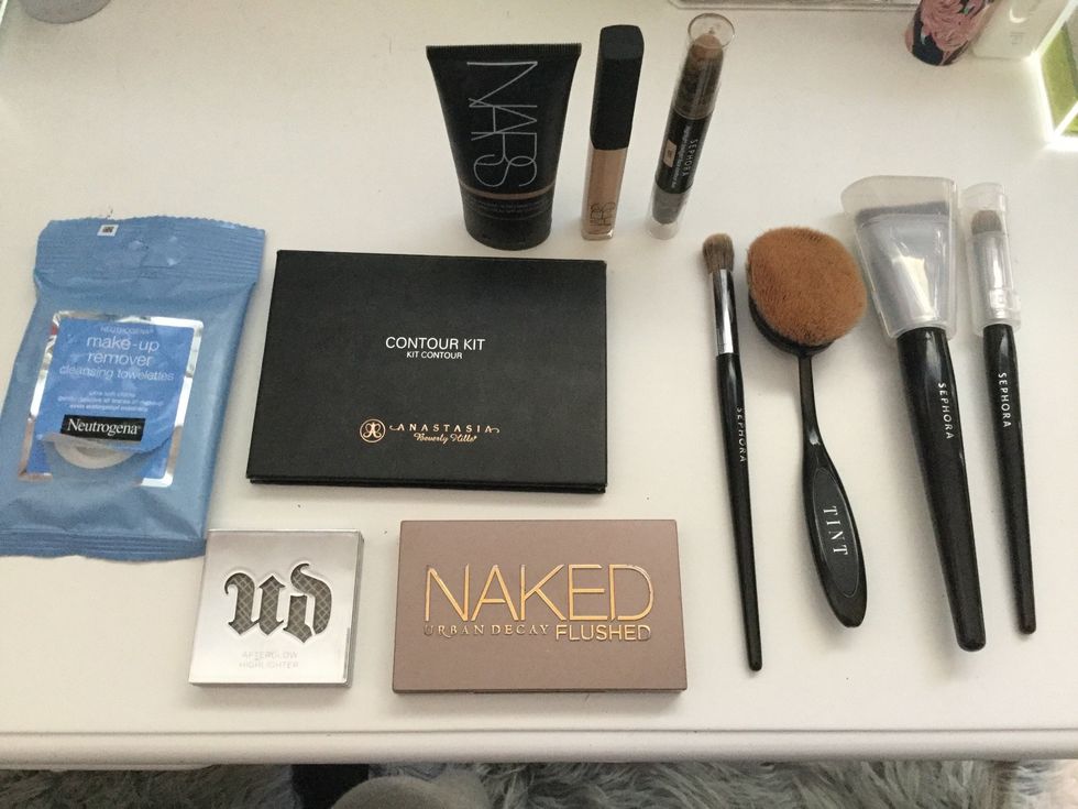 First, get all of your supplies together! (Your contour, foundation and concealer are not the same color as the ones above, they should match your skin tone.)