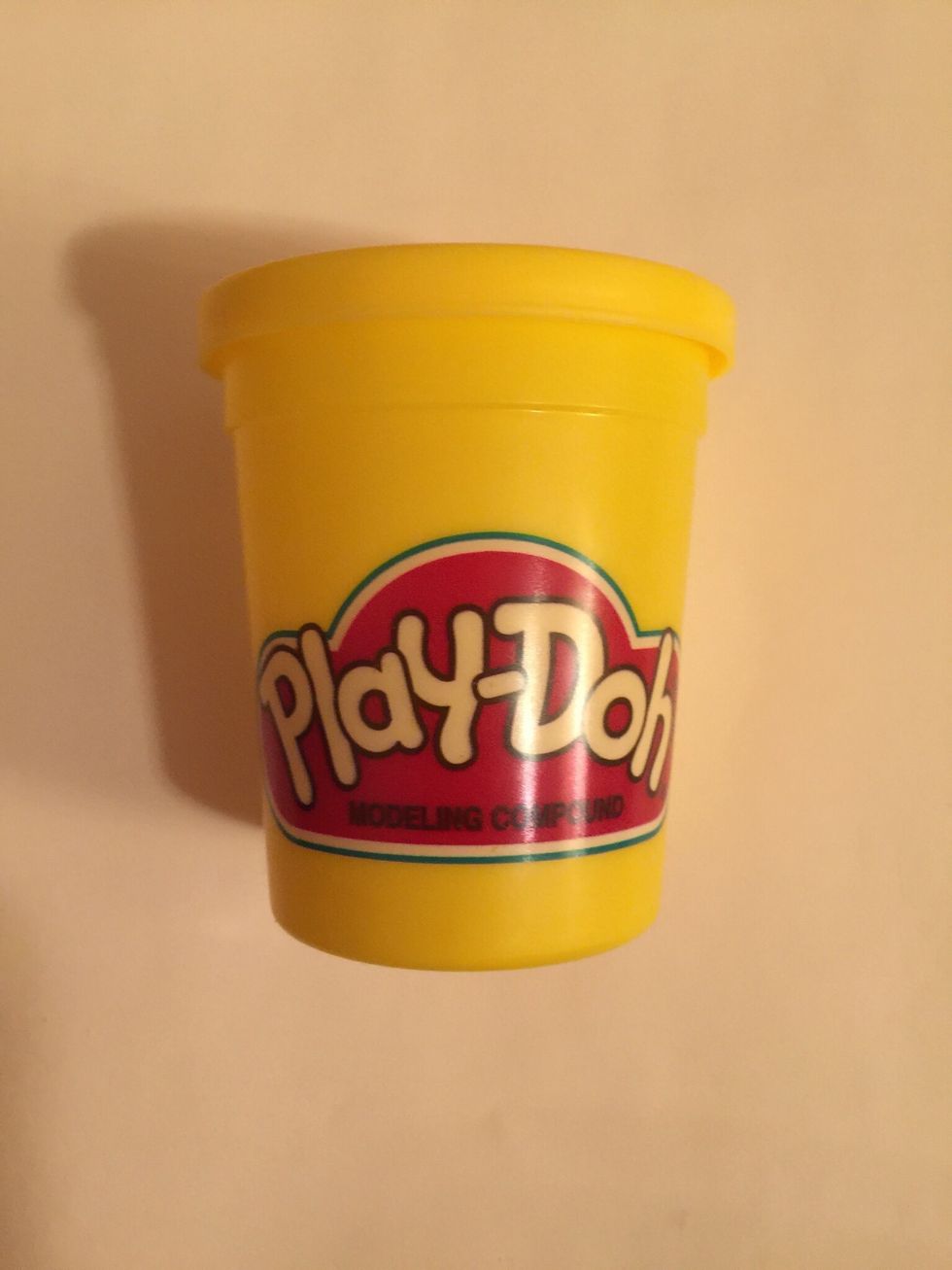 First get some yellow clay or play doh