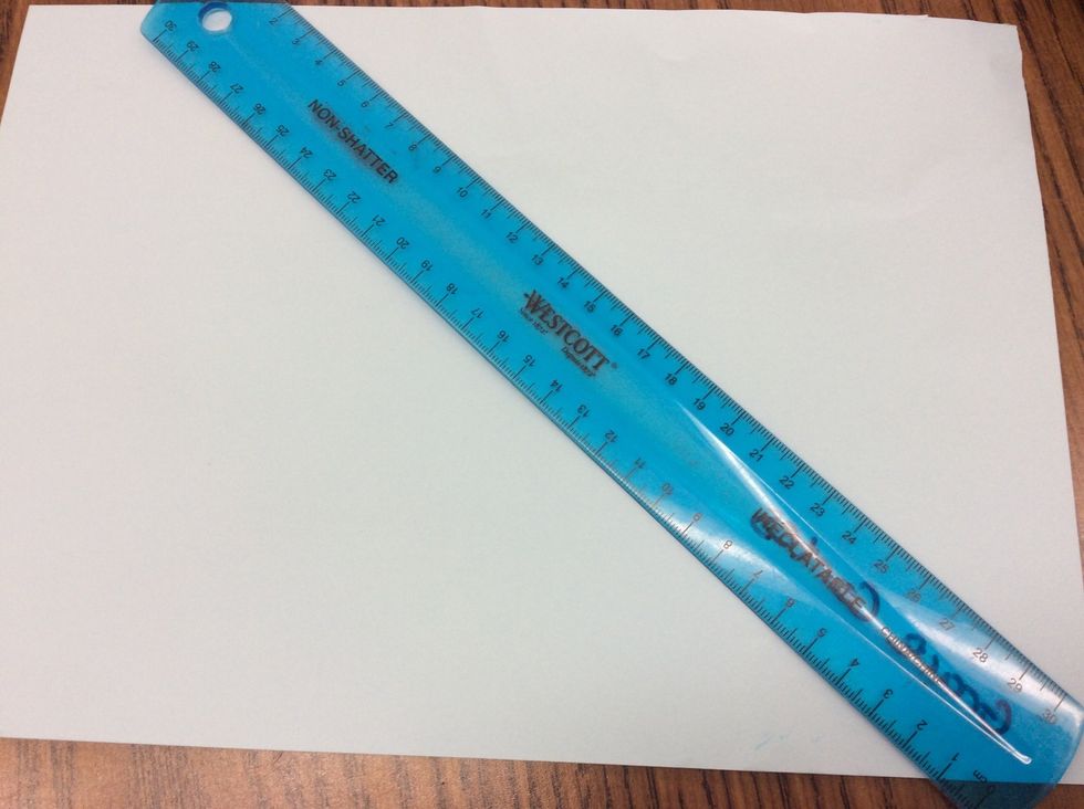 First Get You're Coloured Paper ( It Can Be Any Colour ) And A Ruler