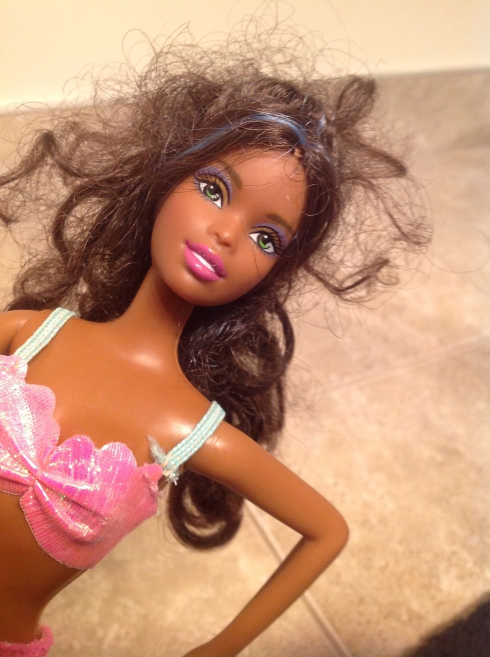 First get your doll.