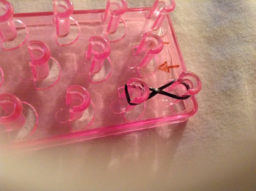 First grab a black band and do a figure of eight.