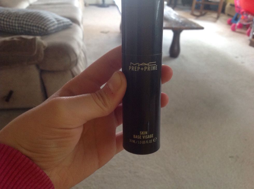 First I am using my makeup primer and putting that all over my face. This is by MAC
