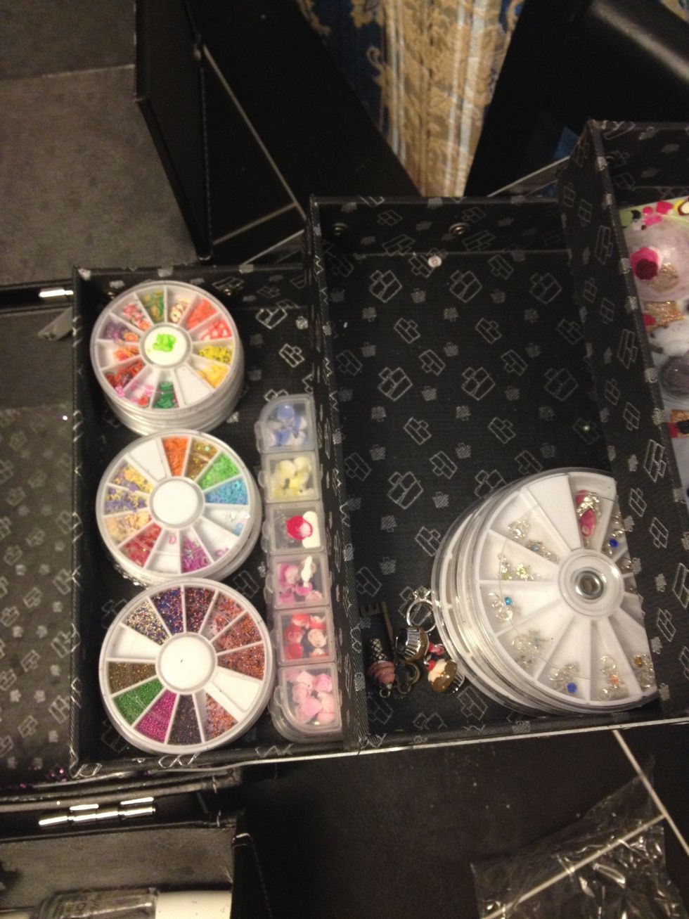 First I empty the box, wipe any old polish off, or glitter and place them where it convenient for me :)