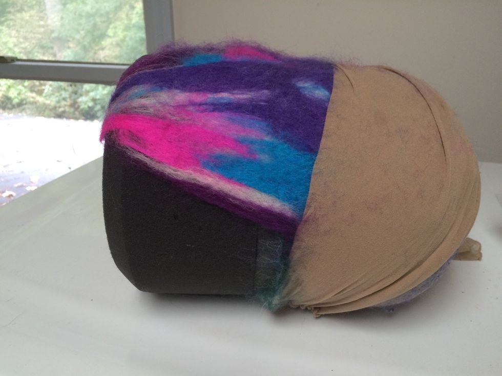 First I layered the wool on my form and put the hose around it. (See part 1) This pic is the first glimpse after being in the dryer with a pair of sneakers on the hottest setting for 20 minutes.