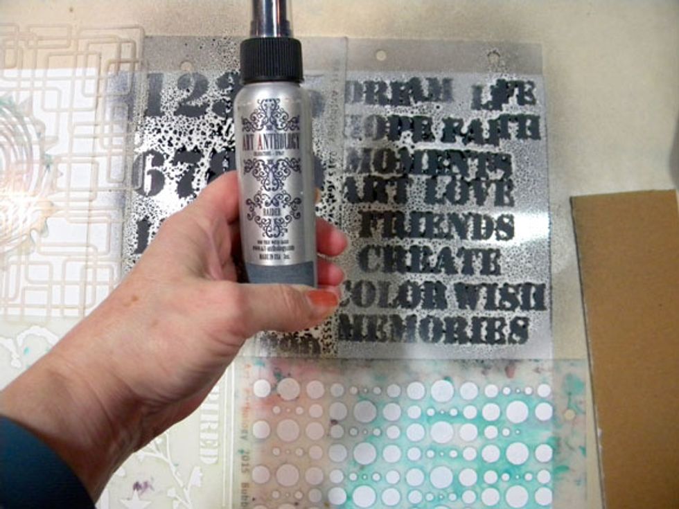 First I sprayed Raider on the Soliloquy and Got Your Number stencils. I kept the stencils in place.