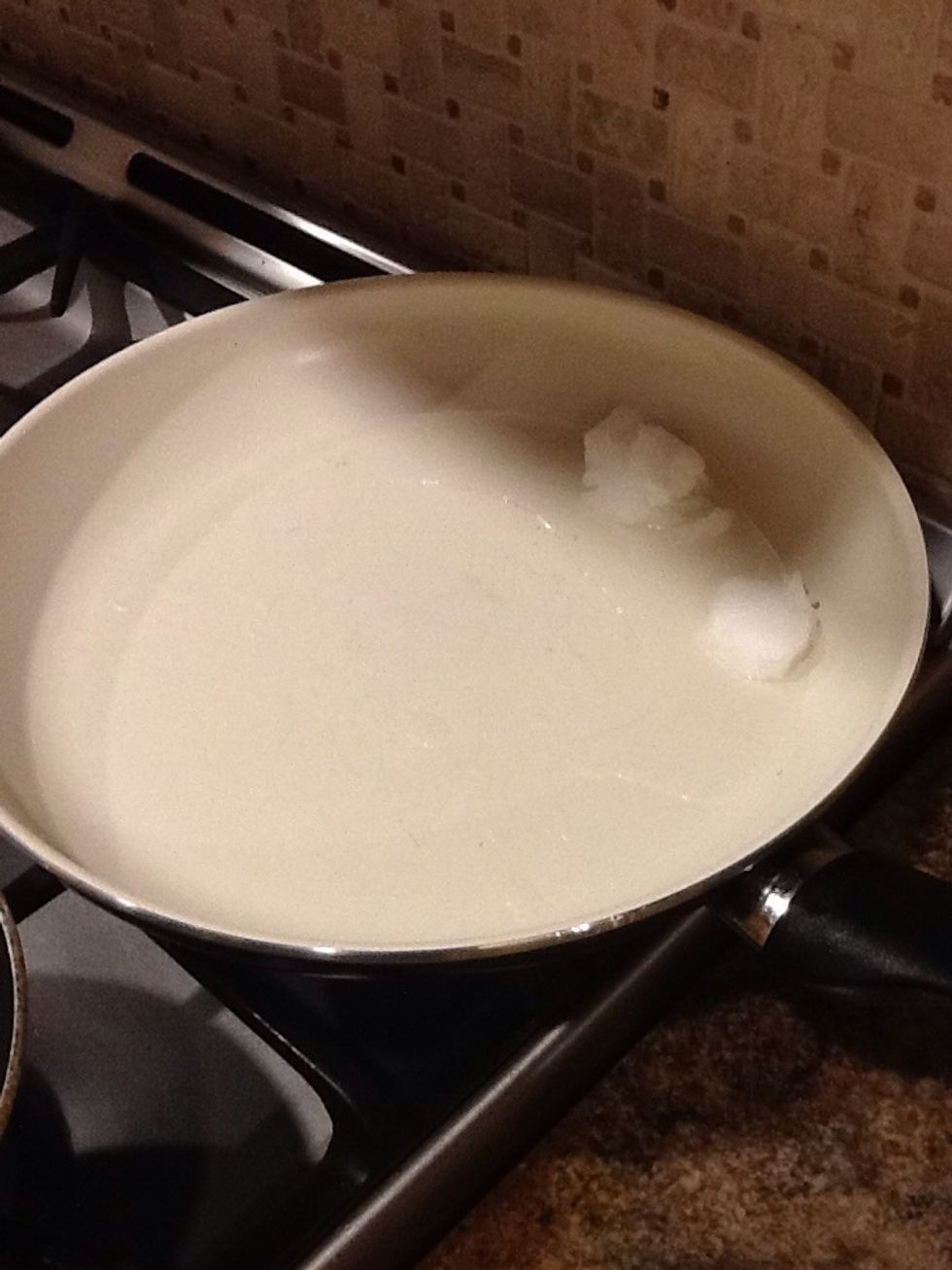 First I started with the coconut oil. Put it in a large skillet and let it melt down. While this is happening I took the nuts and chopped them in my vitamix.