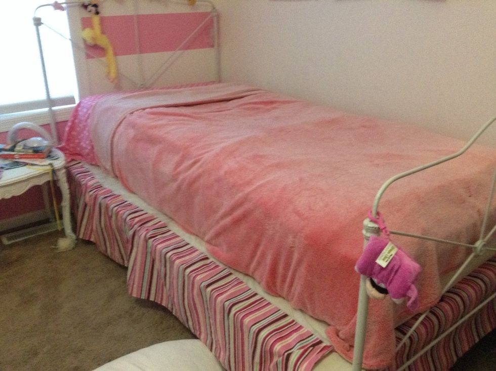 First I take my pink one and tuck it in nicely and I like folding over the top but you don't have to.