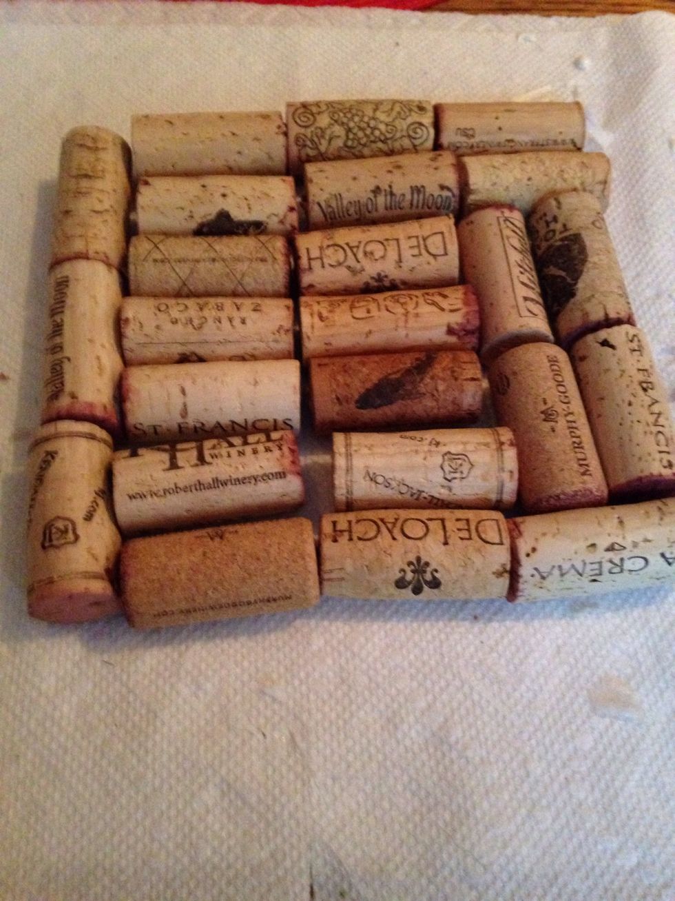 First lay out, roughly, how you want to glue your corks.