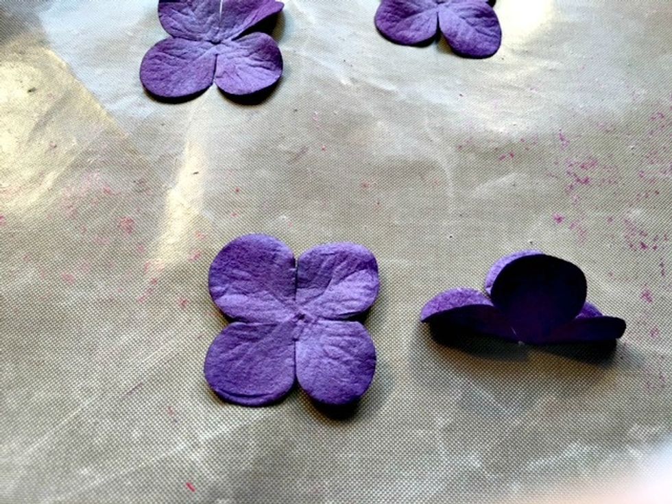 First layer is layed out float for foundation, second layer is two sets that fold in half and are glue to the center of the foundation layer.