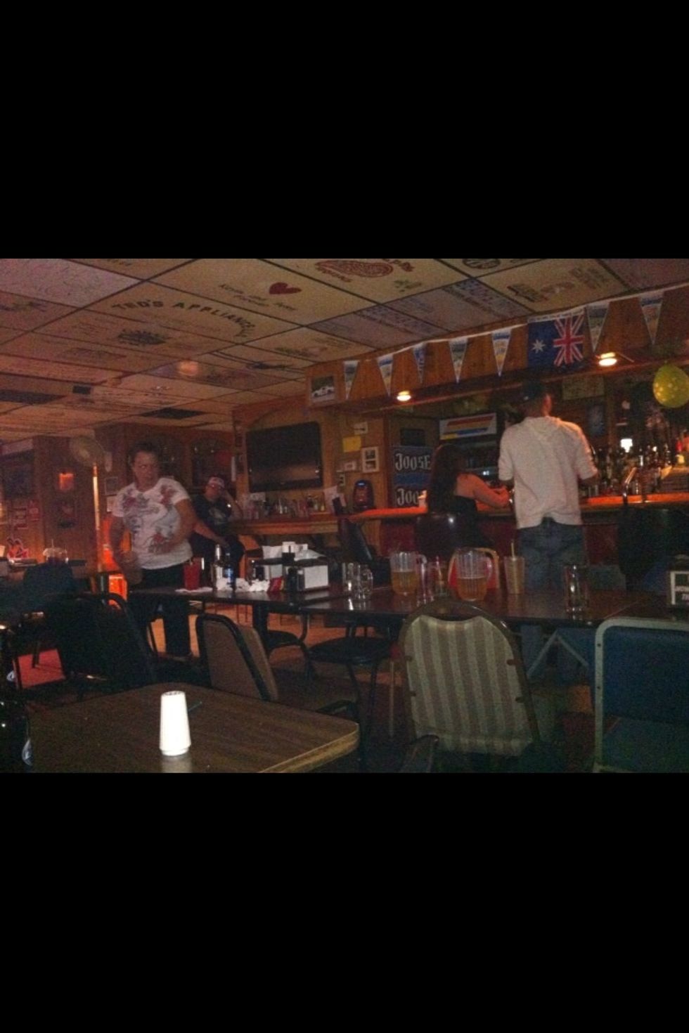 First let's cover the basics. We'll delete an individual photo from camera roll. Go to the photo you want to delete. If you don't see the menu tap the image to open the menu.