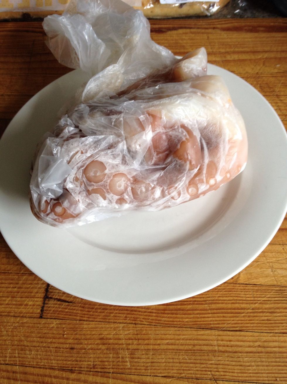 First lift your octopus from the freezer. YOU NEED TO FREEZE THE OCTOPUS TO HELP TENDERISE IT