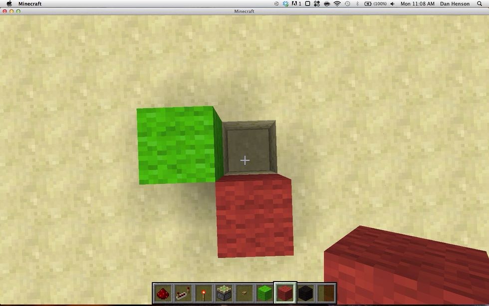 First make a hole with two blocks next to it like this. Green is input and the hole is output.