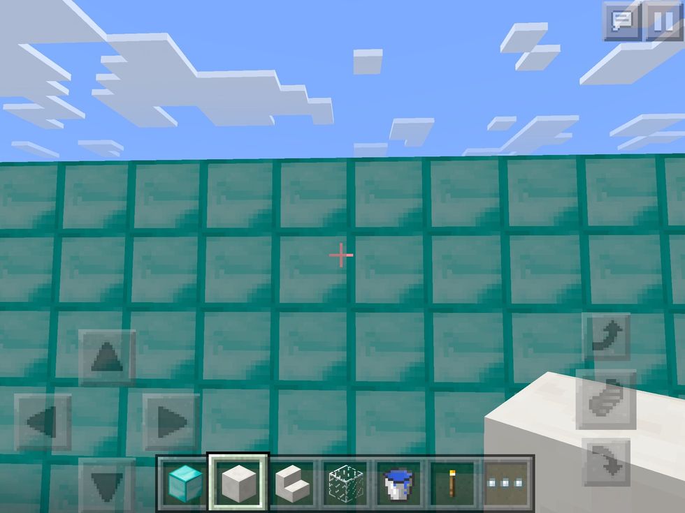 First make a wall 15 blocks across and 5 blocks up. ( if you want to make your walls and floor blue make it out of diamond blocks )