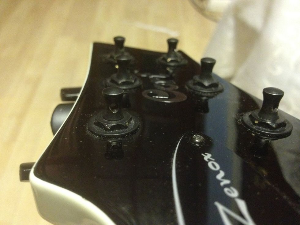 First make sure the machine head hole is Straight