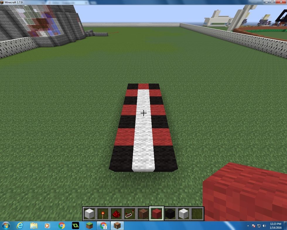 First make this shape with the different colors that you choose. This is about a 3 by 7 shape. The Black Wool is where I would be putting the Note Blocks and the Red Wool is where I put the Repeaters.