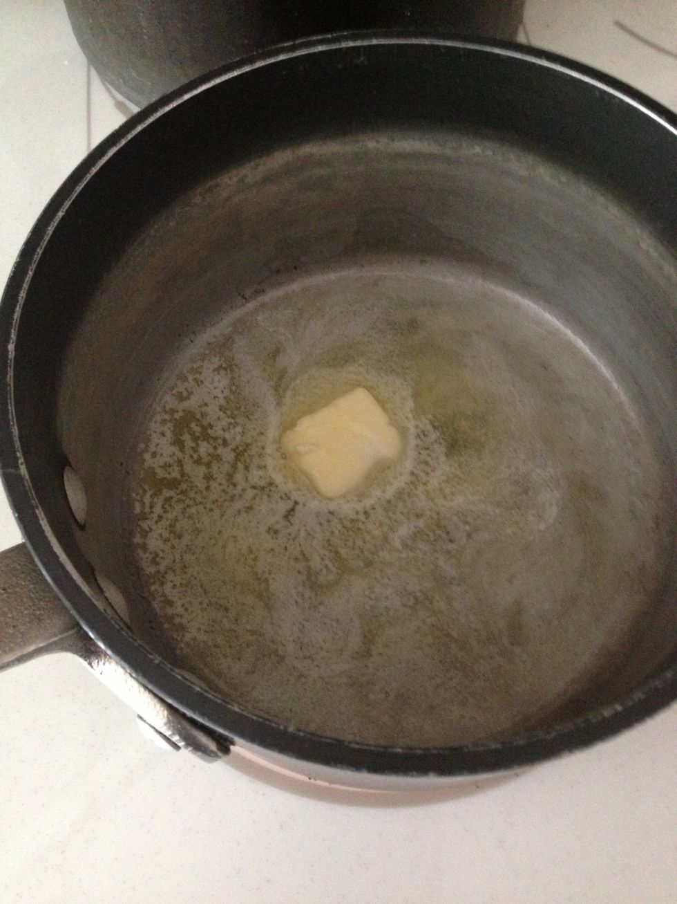 First melt the butter on medium heat.