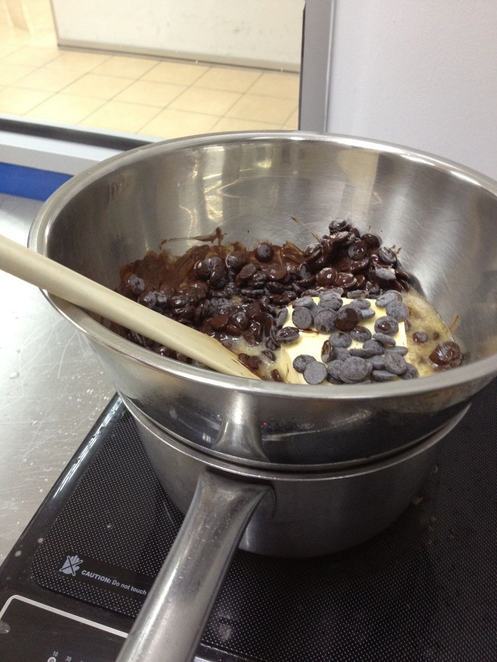 First, melt your butter and chocolate over a double boiler or you could use the microwave.