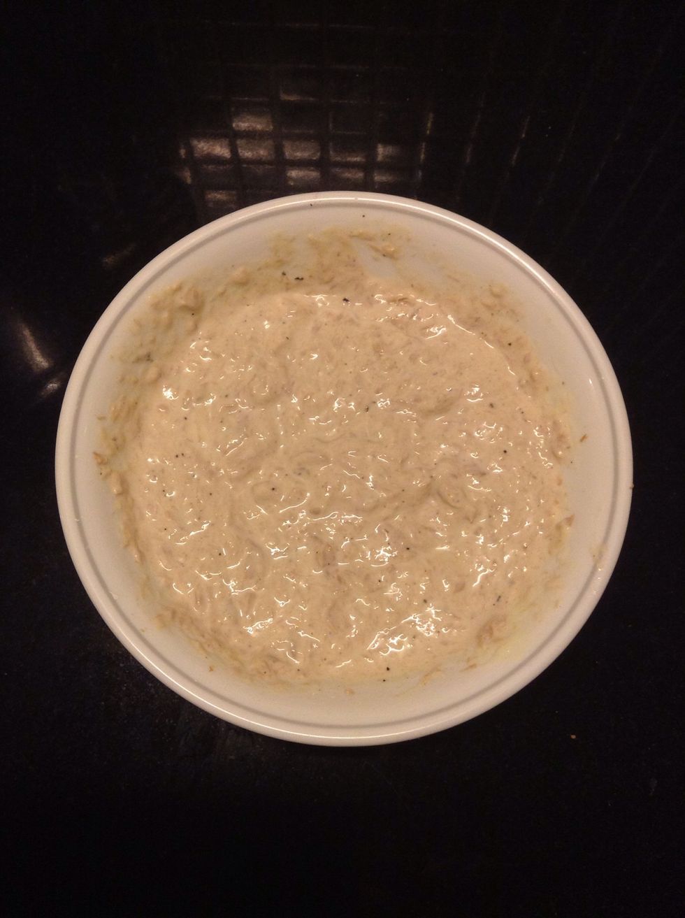 First mix the tuna and mayonnaise. Then add pepper and salt to taste until you come up with something that looks like this. Put a lil less mayonnaise so that it will not spill out of the cucumber.