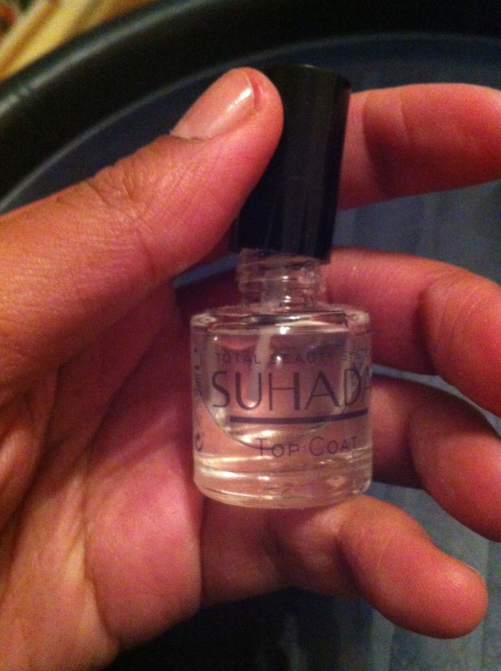 First of all apply a base coat to protect and strengthen your nails