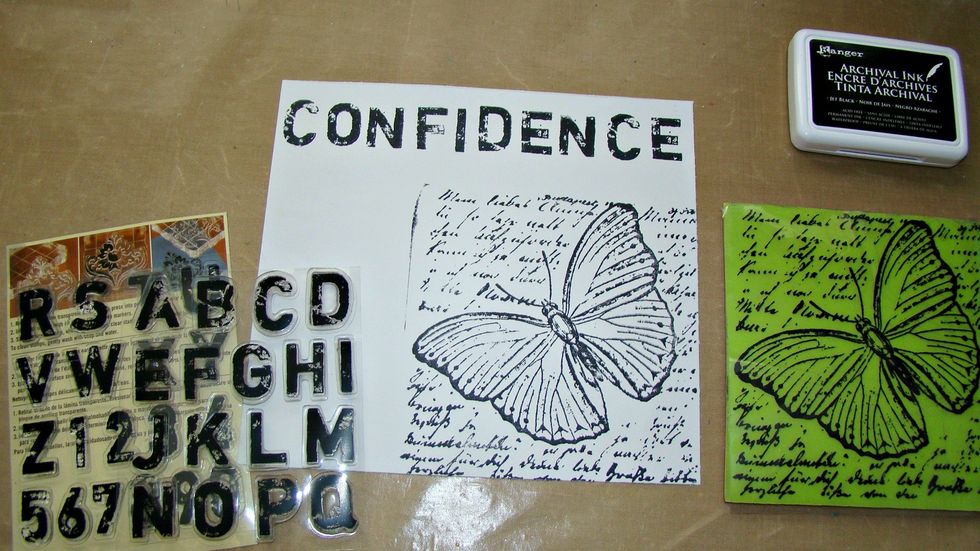 First of all, choose your inspirational word, and using black archival ink stamp. I then stamped a very old image I've had forever. So sorry I can't remember what company it's from.