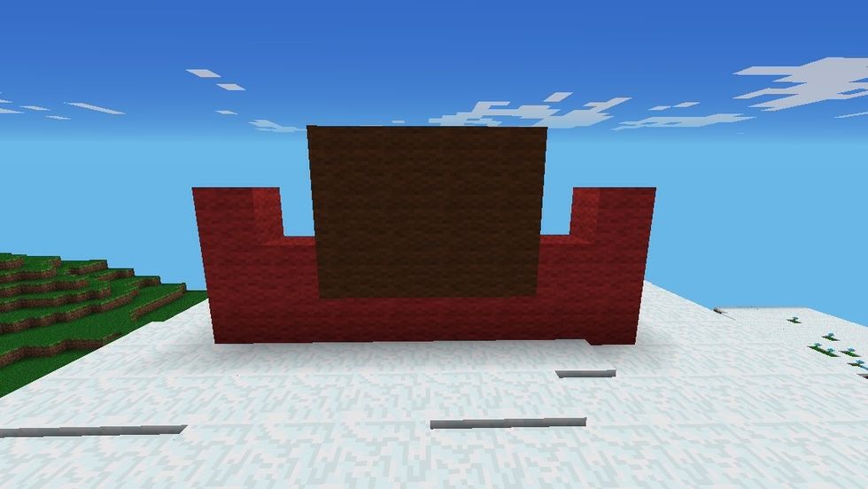 First of all, make the red pot at the bottom to hold the tree and then build up 3 lines of 4 for the trunk