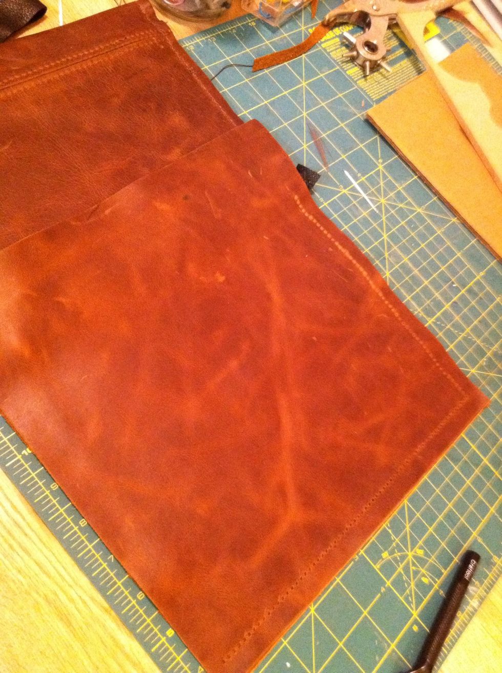 First of all, you want to start with a scrap piece of leather about 2' x 11". You can pick up som leather at a local upholstery shop. It's about $7 bucks a pound. This scrap cost $5.