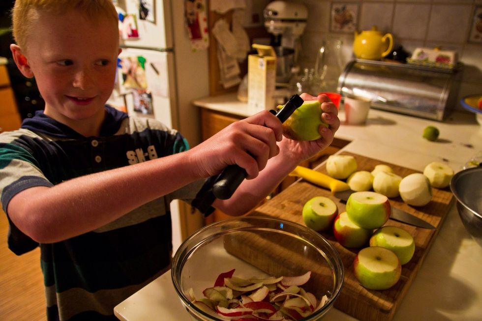 First of all your going to need to peel and core the apples. Dad taught me to take the ends off of the apples first, I find them a lot easier to peel this way!