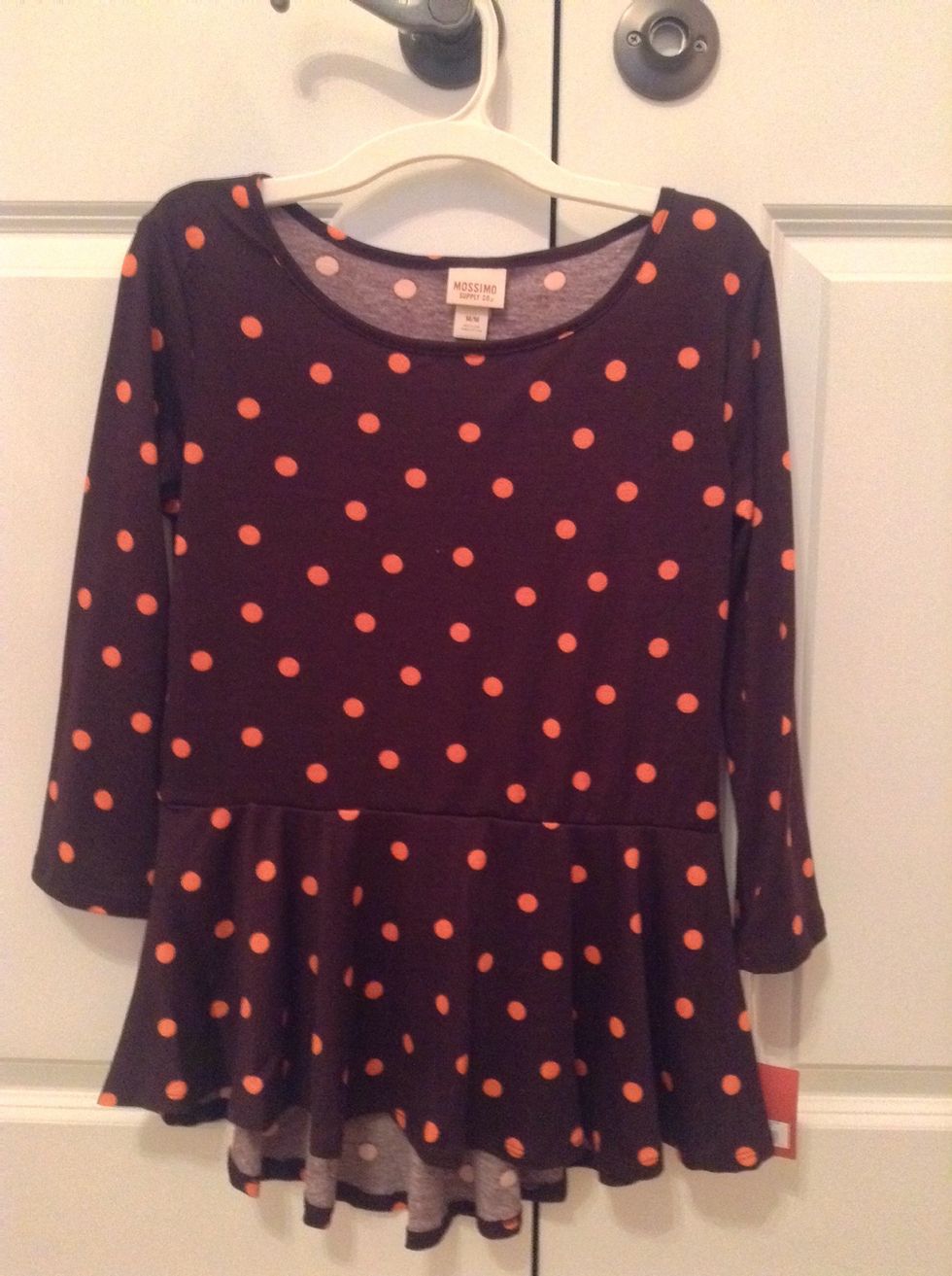 First off, I got this really cute pink and brown polka dot peplum top.
