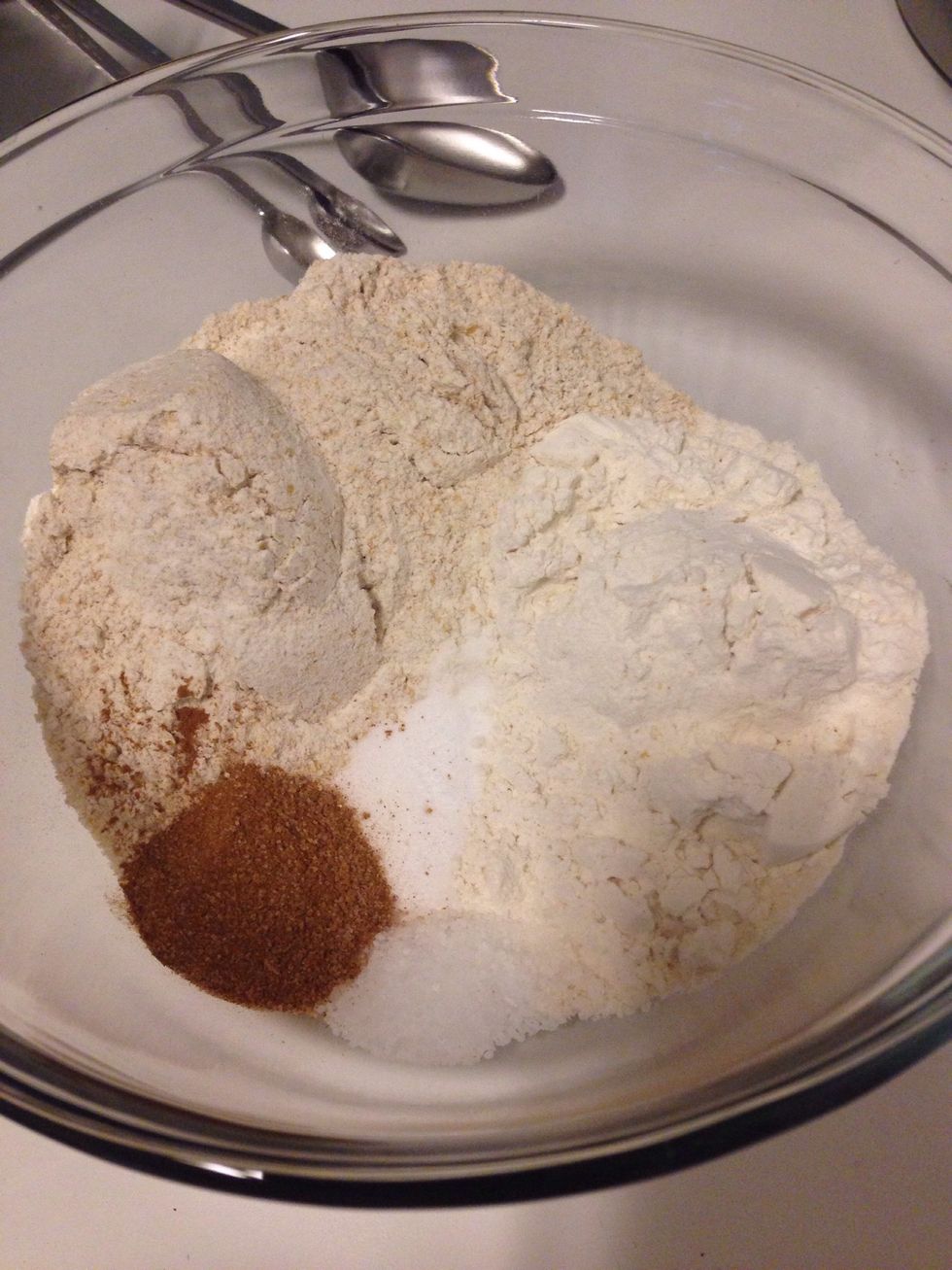 First off, these muffins are LEGIT. SO moist and delicious!! Preheat oven to 350*F and line a 12 cup muffin tin. In a small bowl, combine flours, baking soda, salt, and cinnamon and set aside.