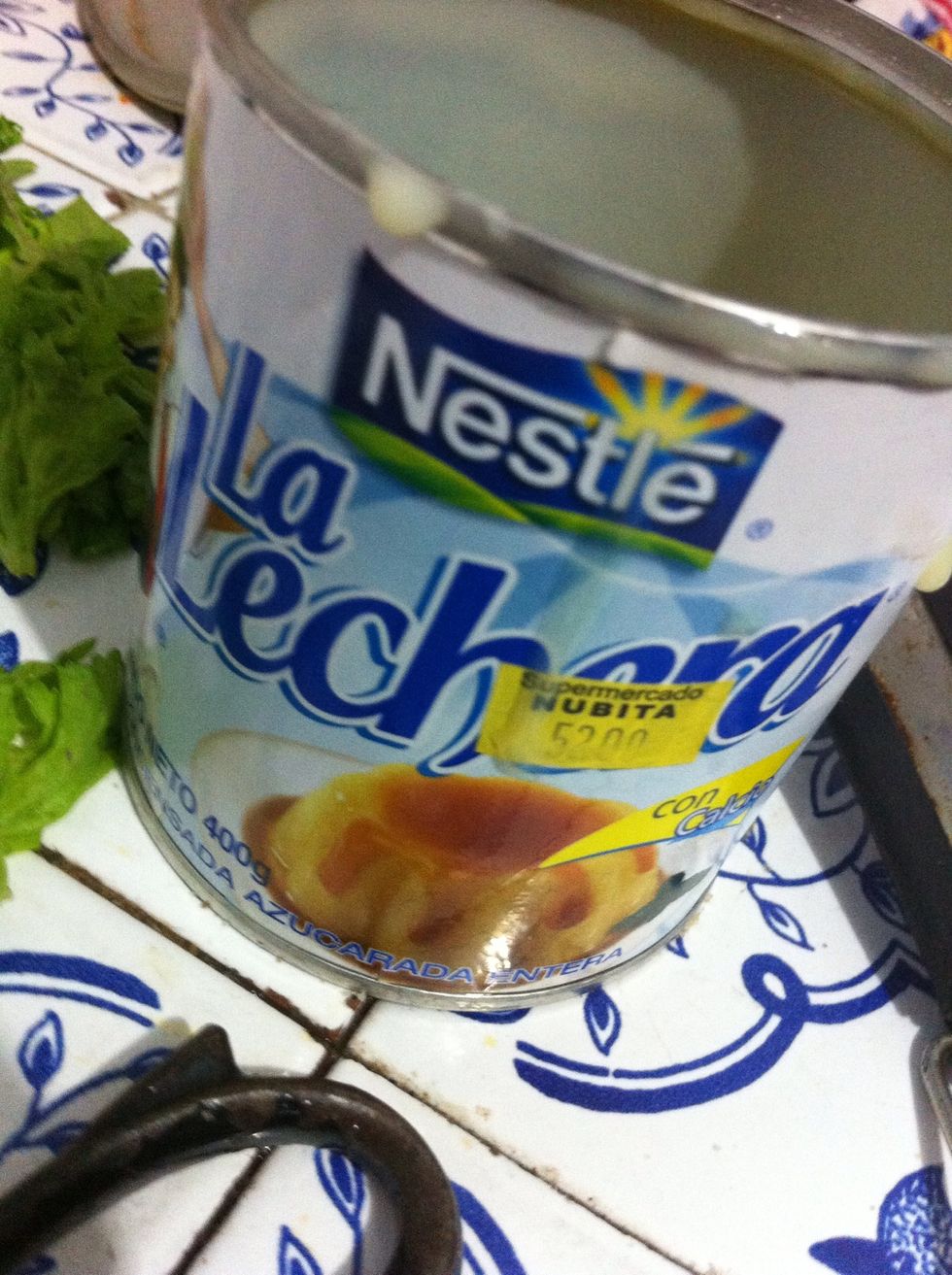 First open your can of condensed milk,..