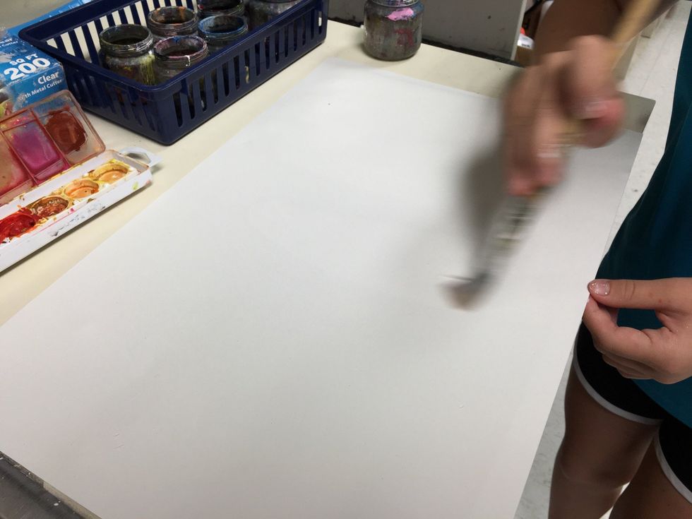 First paint the paper with just water.