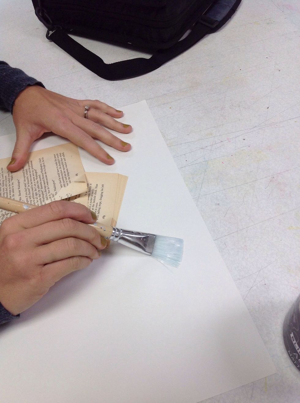 First paint the paper with varnish in a small area where the paper will go.