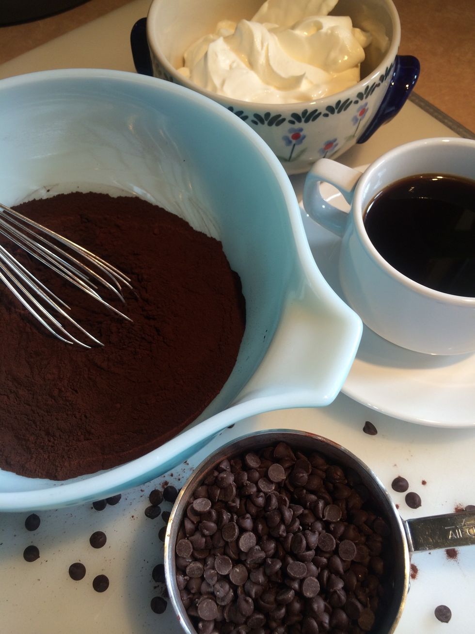 First part: 1 cup cocoa, 3/4 cup chocolate chips, 3/4 cup hot coffee and 1 1/2 cup sour cream.