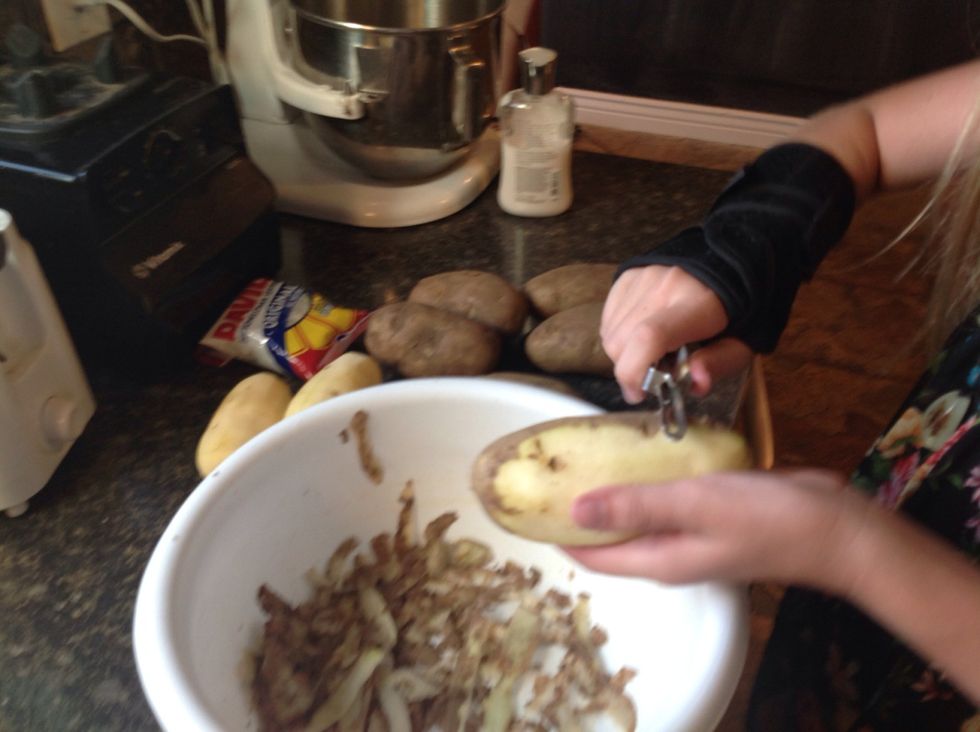 First peel 8 potatoes my family does 8, because we have a BIG FAMILY!!!!!