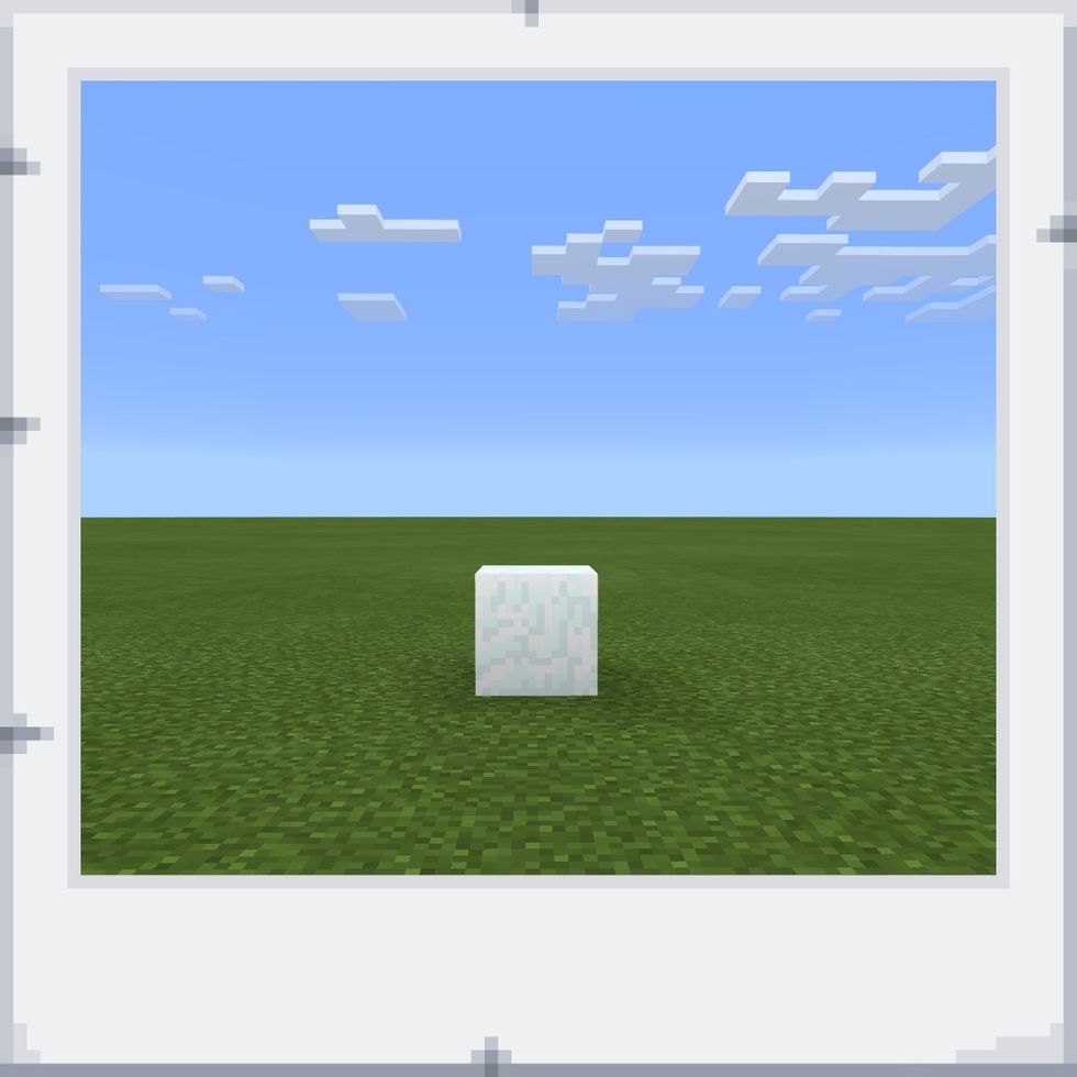 First, place a block of snow on the ground where you want to build your snow golem.