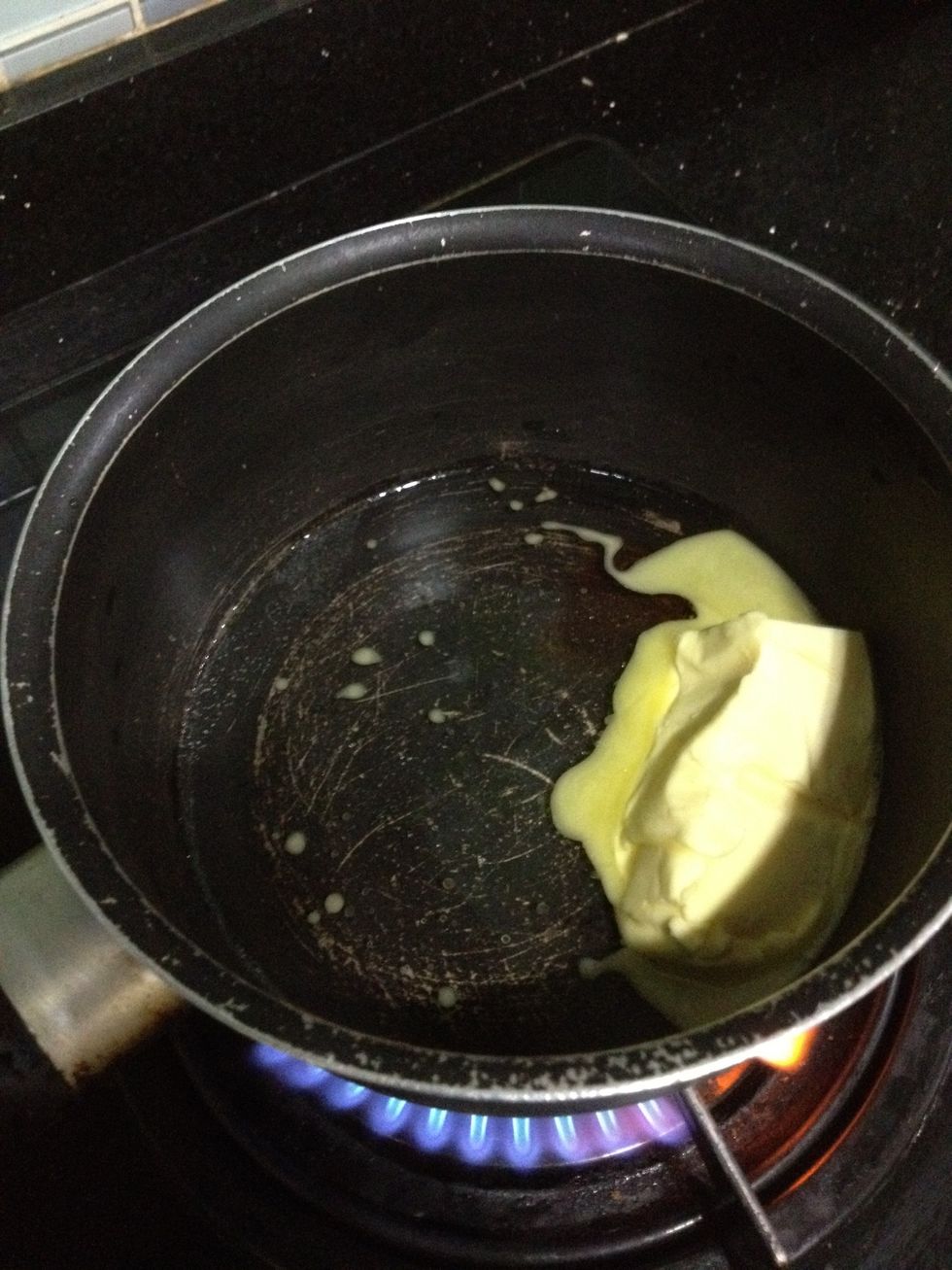 First place the butter and water in a small saucepan and bring it to a boil.