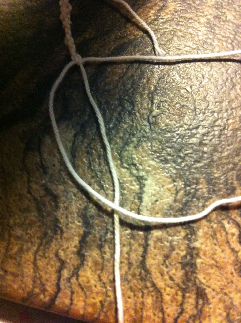 first place the left cord over the middle rope