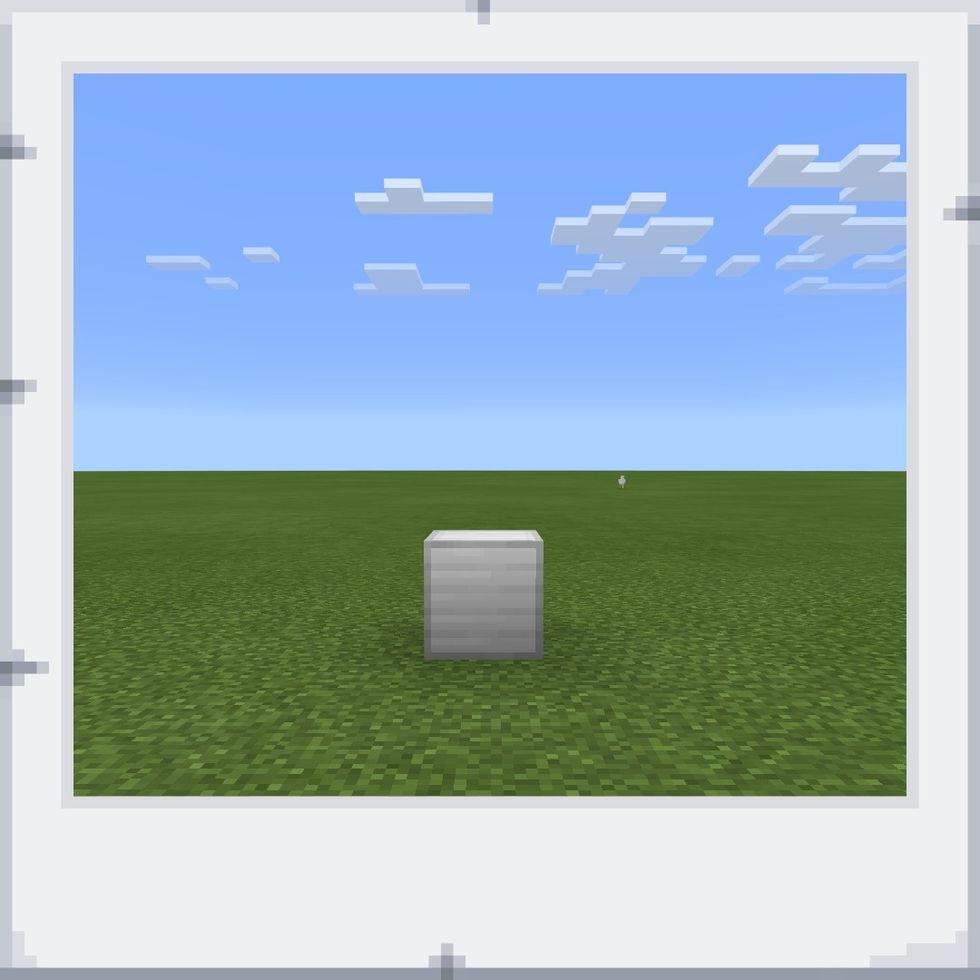 First, place your block of iron on the ground, where you want your iron golem to be.