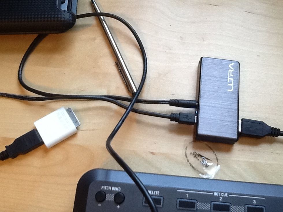 First: plug in the camera connection kit and the wall adapter into your POWERED USB hub, I used the Ultra Aluminus hub from tiger direct