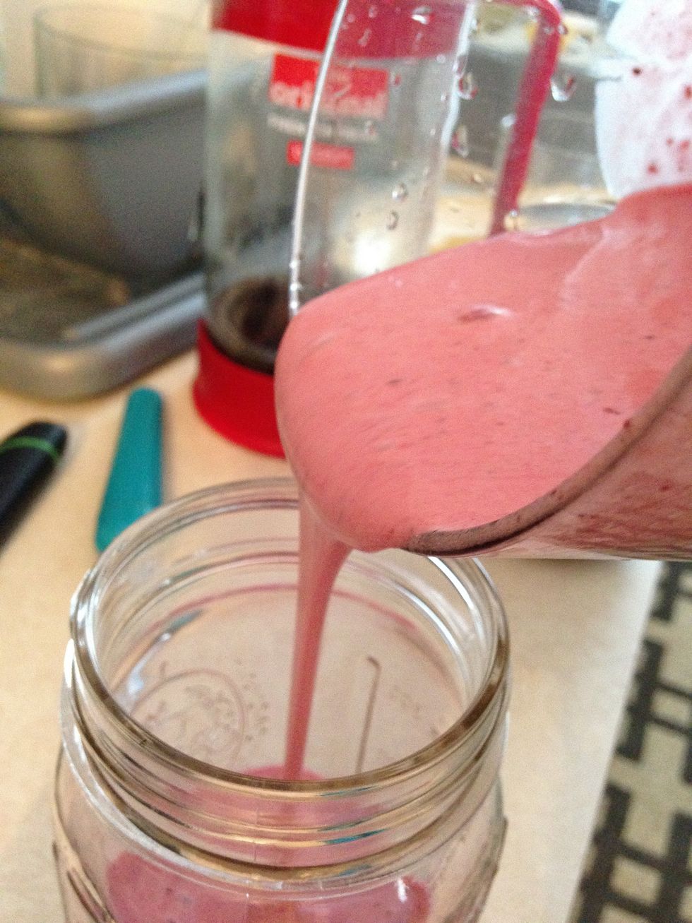 First, pour kefir into the blender so as not to blend the solids with a dry blade. Blend. Scrape the cup with a spatula to reintroduce rogue protein powder. Blend until completely mixed.