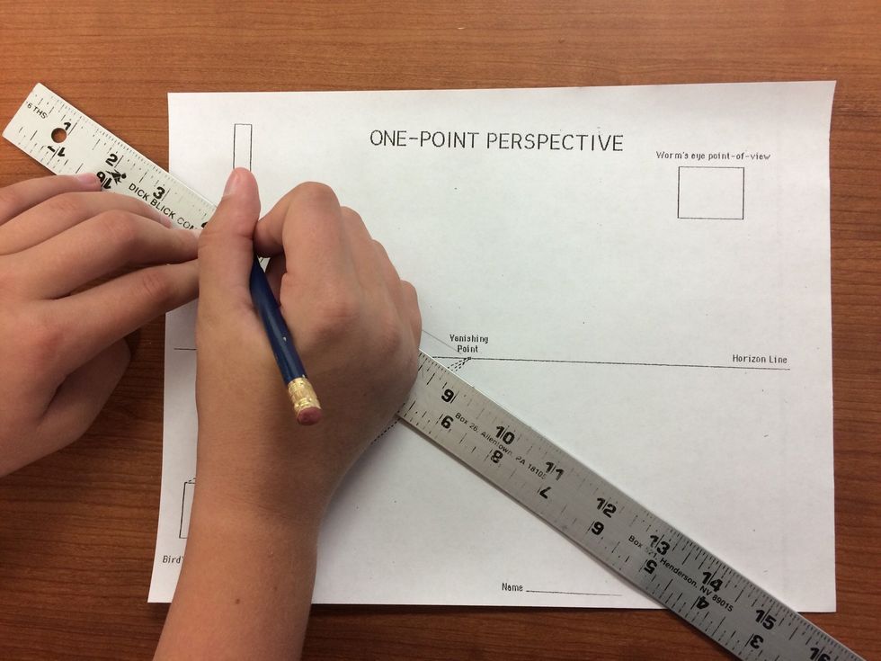 First, practice connecting the corners of the shapes to the vanishing point using a ruler.