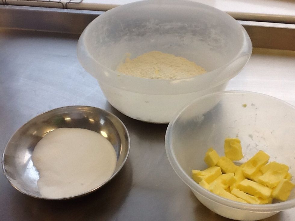 First pre-heat the oven to 180c/gas mark 4. grab the flour, butter and sugar. Mix the flour and sugar together, then add the butter