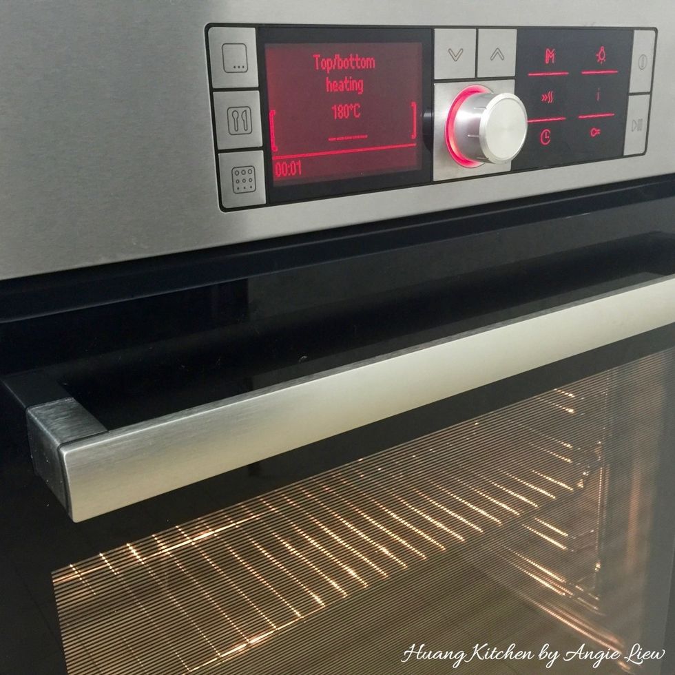 First, preheat oven to 180 degree C and arrange baking tray to be in the centre of oven.
